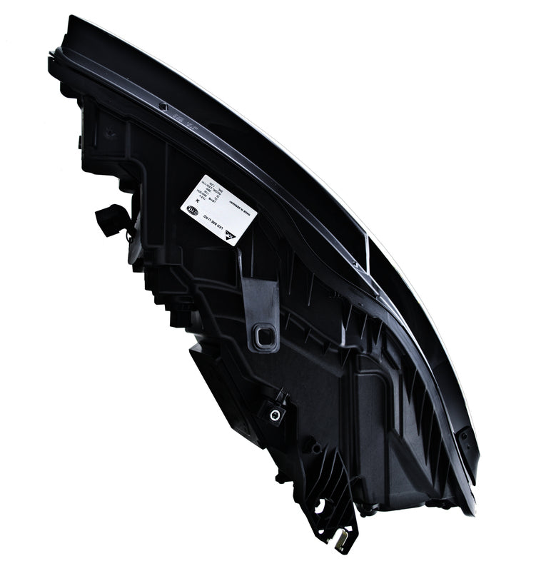 HELLA Headlight Assembly - 011151461