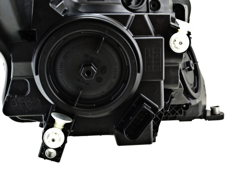 HELLA Headlight Assembly - 011284551