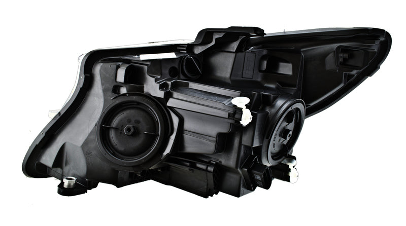 HELLA Headlight Assembly - 011284561