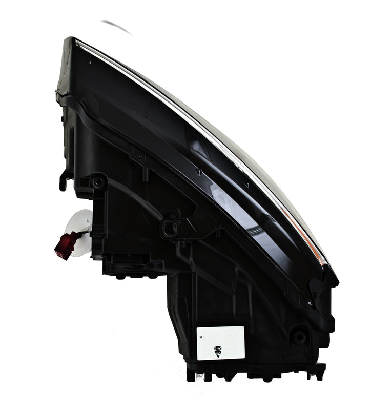 HELLA Headlight Assembly - 011496461