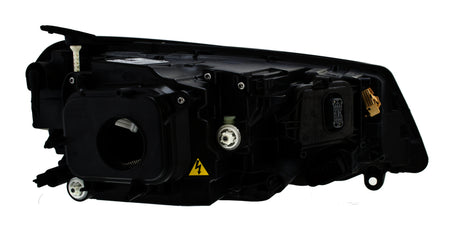 HELLA Headlight Assembly - 011937451
