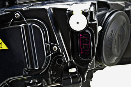 HELLA Headlight Assembly - 011956251