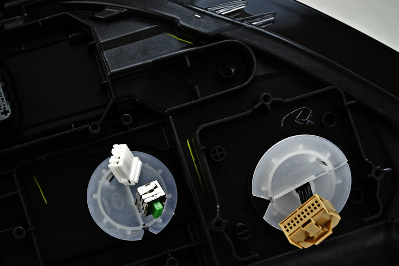 HELLA Headlight Assembly - 011956261