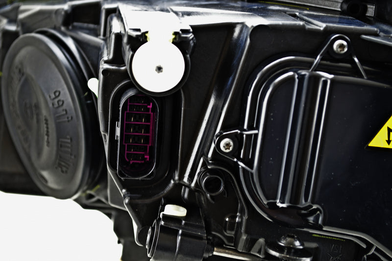 HELLA Headlight Assembly - 011956261