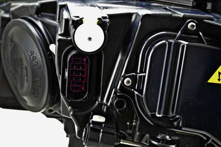 HELLA Headlight Assembly - 011956261