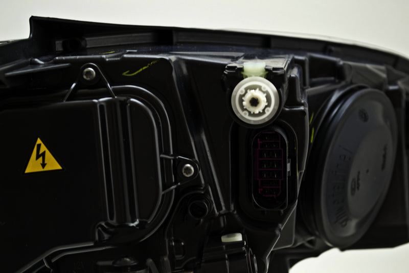 HELLA Headlight Assembly - 011956271