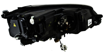 HELLA Headlight Assembly - 011956271