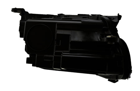 HELLA Headlight Assembly - 012076551