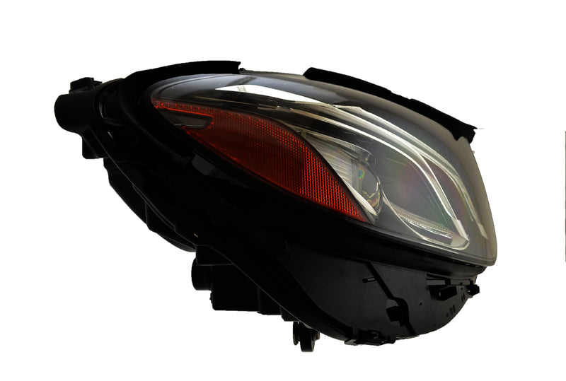 HELLA Headlight Assembly - 012076561