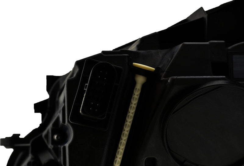 HELLA Headlight Assembly - 012076661