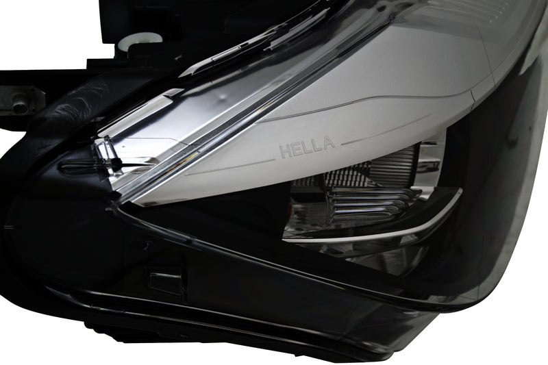 HELLA Headlight Assembly - 012101961