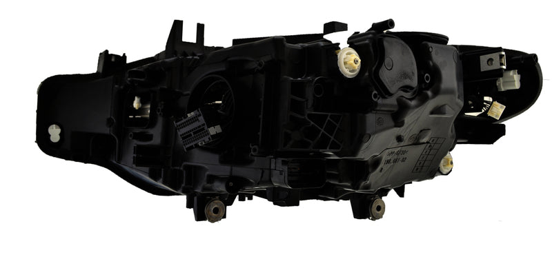 HELLA Headlight Assembly - 012102961