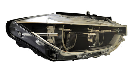 HELLA Headlight Assembly - 012102961