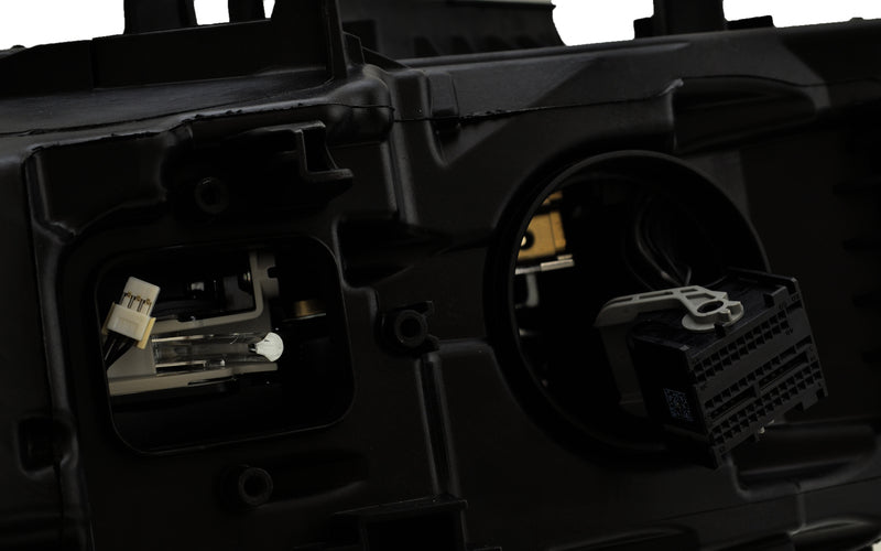HELLA Headlight Assembly - 012102961