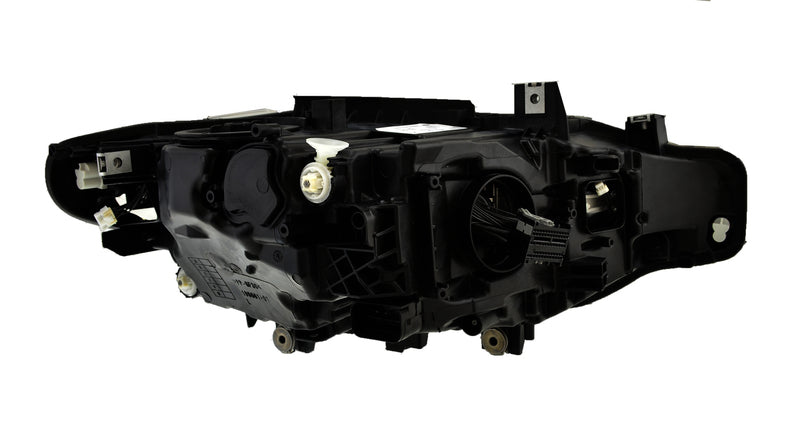 HELLA Headlight Assembly - 012103951