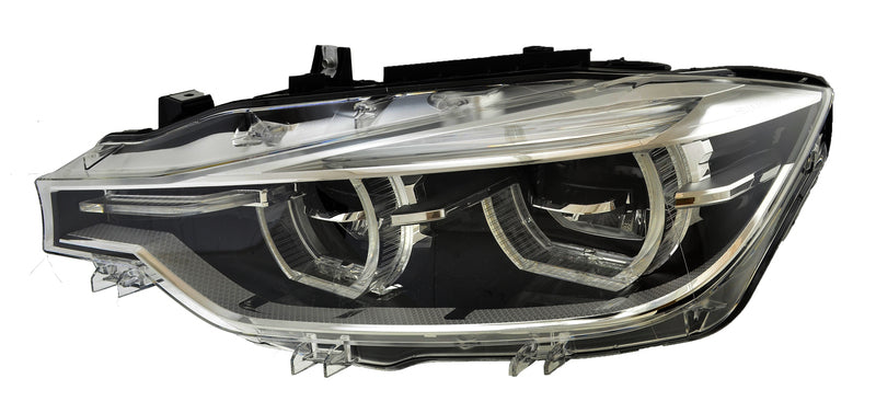 HELLA Headlight Assembly - 012103951