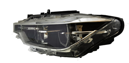 HELLA Headlight Assembly - 012103951