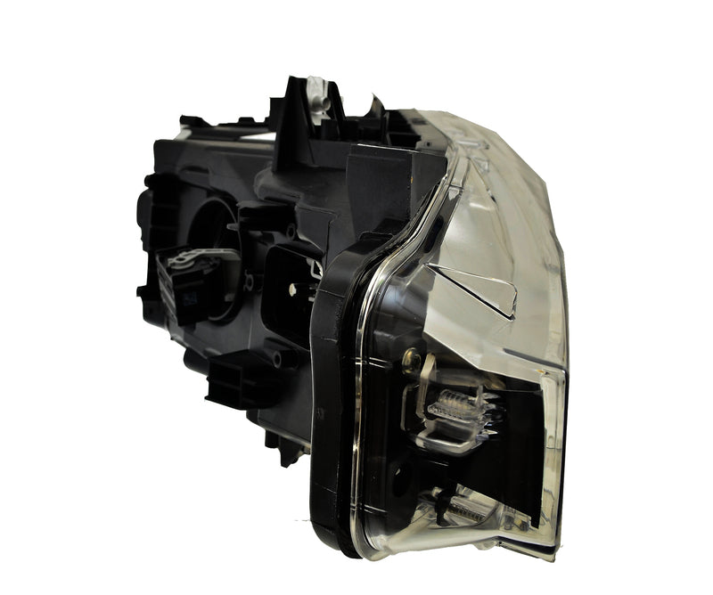 HELLA Headlight Assembly - 012103951