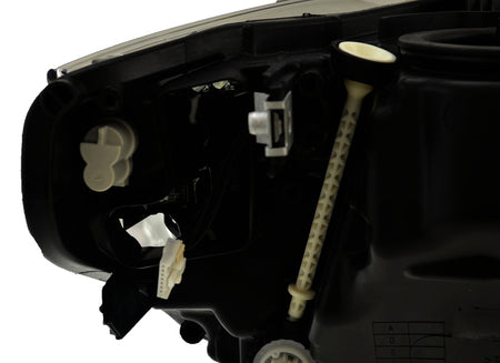 HELLA Headlight Assembly - 012103951