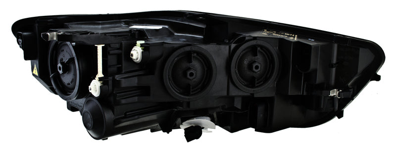 HELLA Headlight Assembly - 012976051