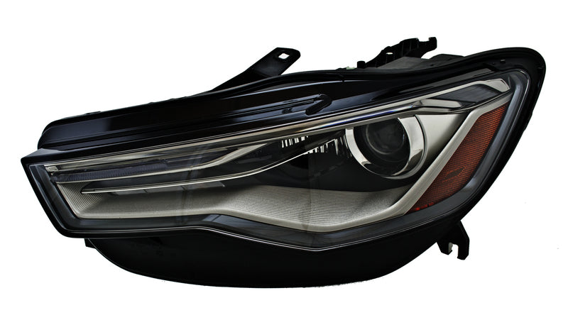 HELLA Headlight Assembly - 012976051