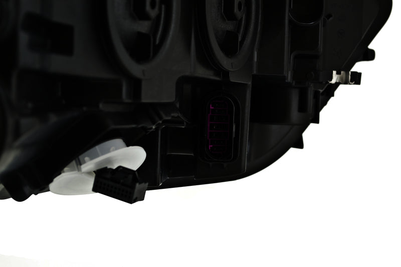 HELLA Headlight Assembly - 012976051