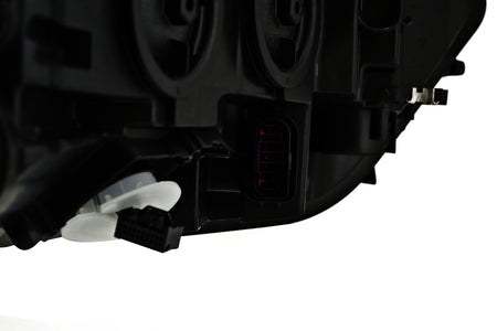 HELLA Headlight Assembly - 012976051