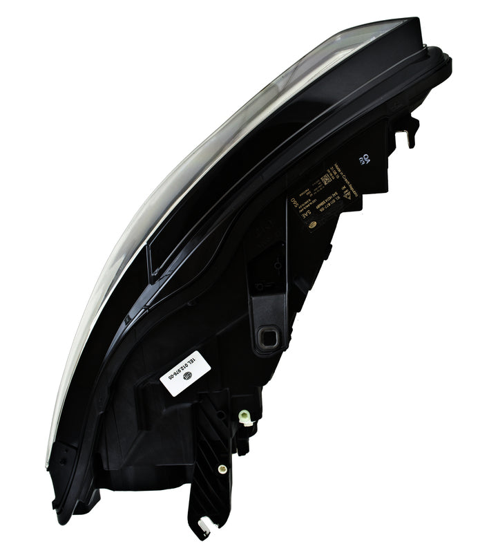HELLA Headlight Assembly - 012976051