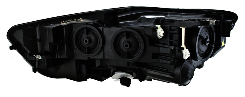 HELLA Headlight Assembly - 012976061
