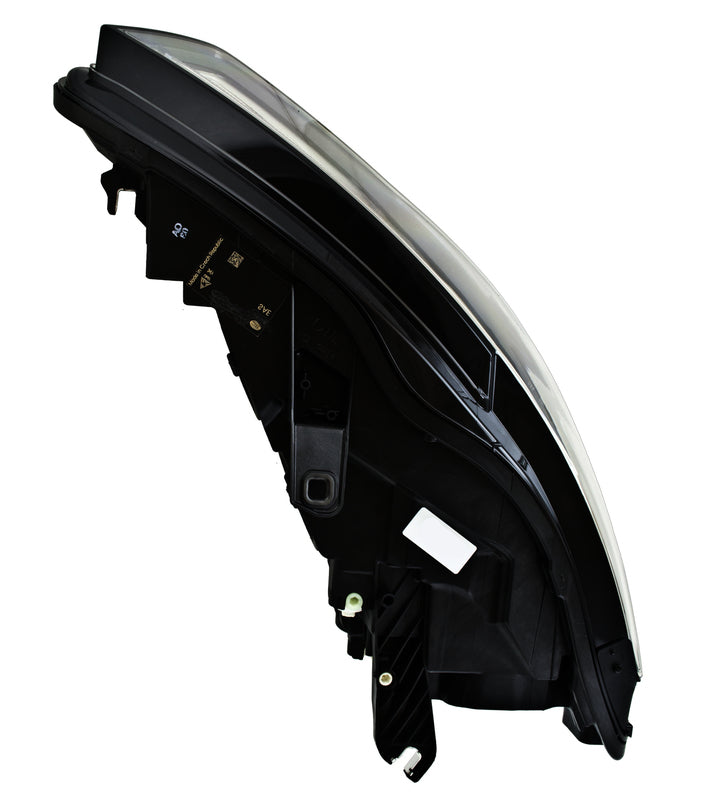 HELLA Headlight Assembly - 012976061