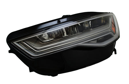 HELLA Headlight Assembly - 012976151