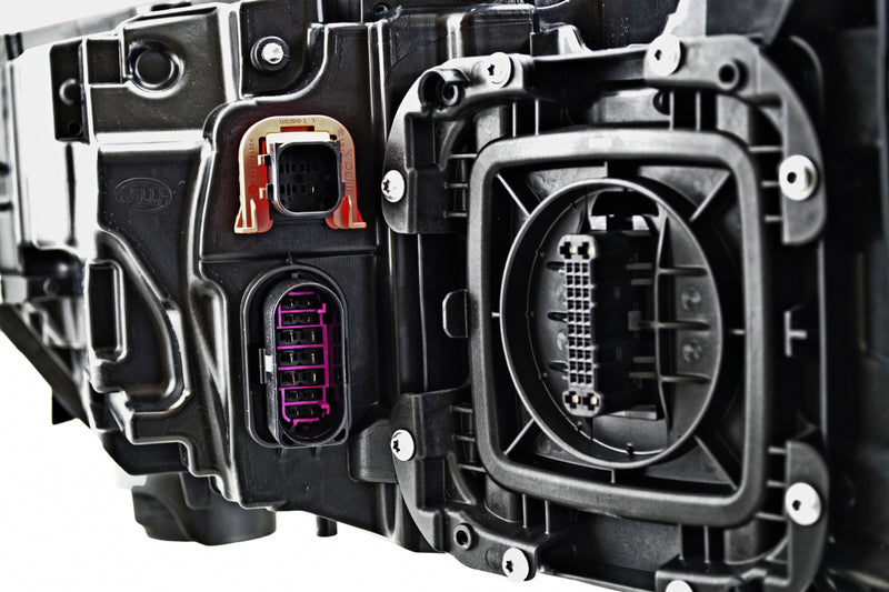 HELLA Headlight Assembly - 012976161