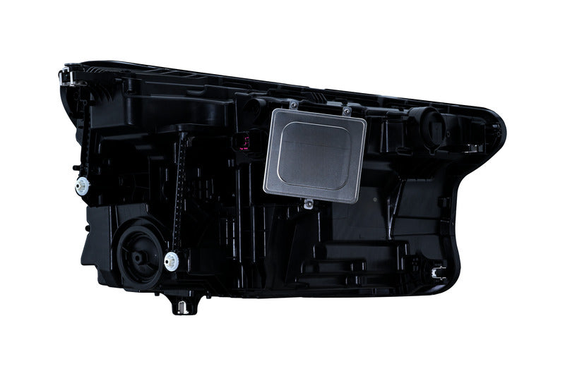 HELLA Headlight Assembly - 015400951