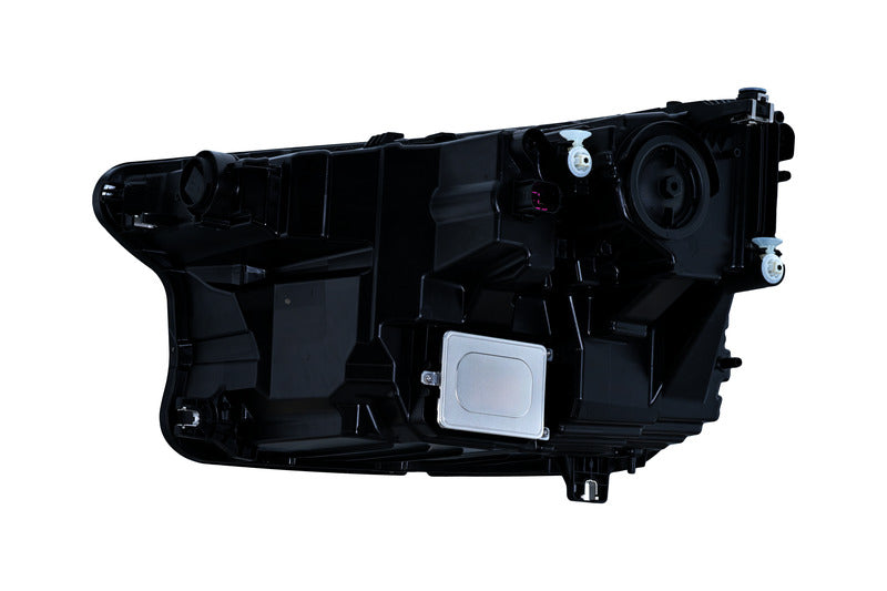 HELLA Headlight Assembly - 015414461
