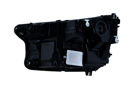 HELLA Headlight Assembly - 015414461