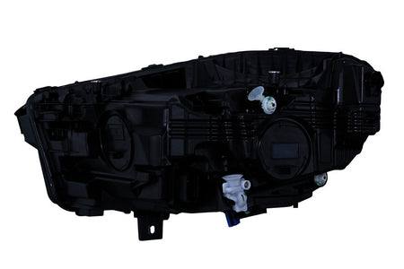 HELLA Headlight Assembly - 015568761