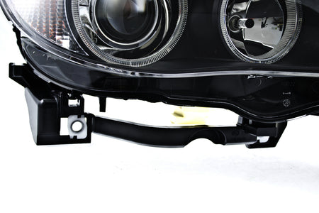 HELLA Headlight Assembly - 160292011
