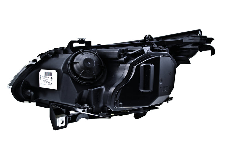 HELLA Headlight Assembly - 160292011