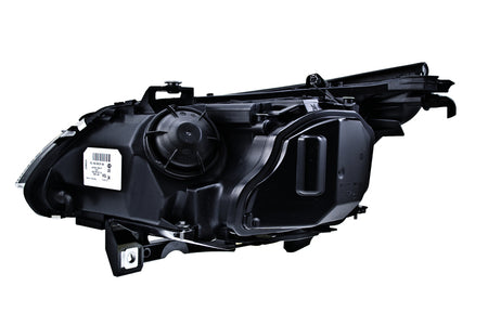 HELLA Headlight Assembly - 160292011