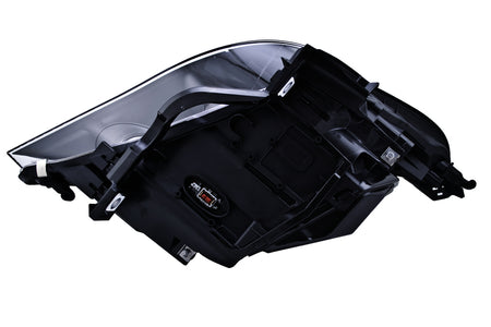 HELLA Headlight Assembly - 164911001