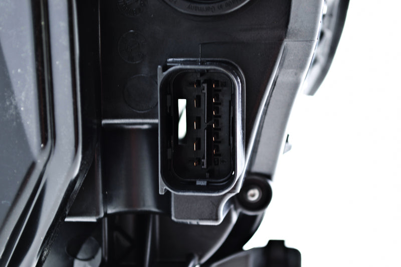 HELLA Headlight Assembly - 164912001