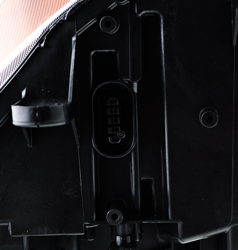 HELLA Headlight Assembly - 247001561