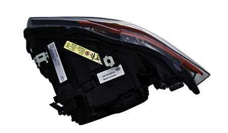 HELLA Headlight Assembly - 354688061