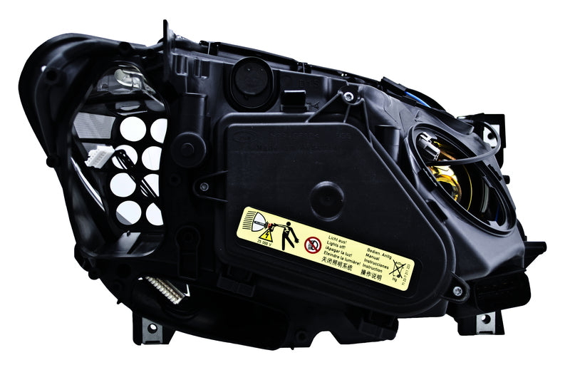 HELLA Headlight Assembly - 354690051