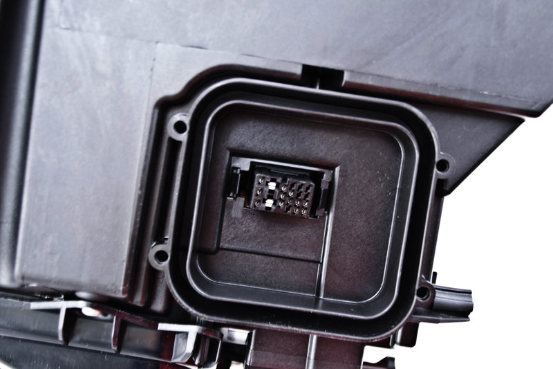 HELLA Headlight Assembly - 354692061