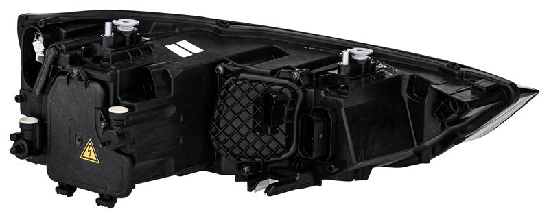 HELLA Headlight - 354838091