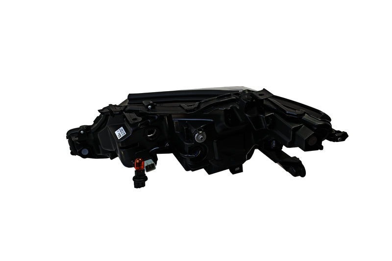 HELLA Headlight Assembly - 354888021