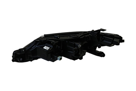 HELLA Headlight Assembly - 354888021
