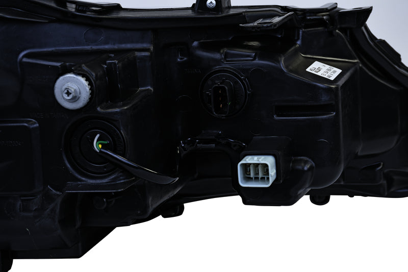 HELLA Headlight Assembly - 354888031