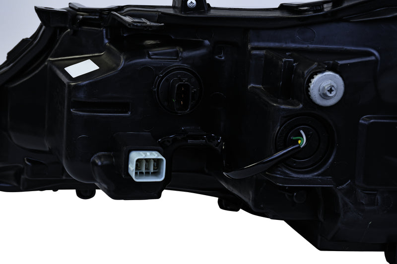 HELLA Headlight Assembly - 354888041